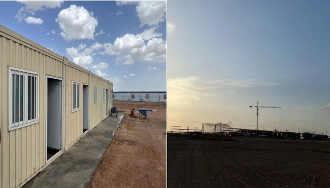 萬(wàn)頃黃沙映壯志，樓閣巍巍矗風(fēng)沙